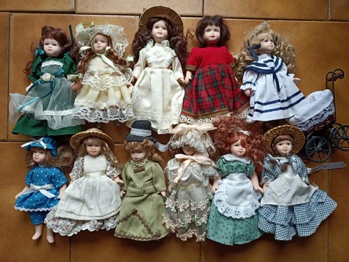 bambole in ceramica 11 pezzi